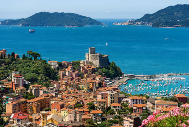 Lerici village and Portovenere - Gulf of La Spezia - Liguria Italy Lerici village and Portovenere or Porto Venere in the background with the Palmaria Island. In the Golfo dei Poeti (Gulf of poets or Gulf of La Spezia) Italy, Europe spezia stock pictures, royalty-free photos & images