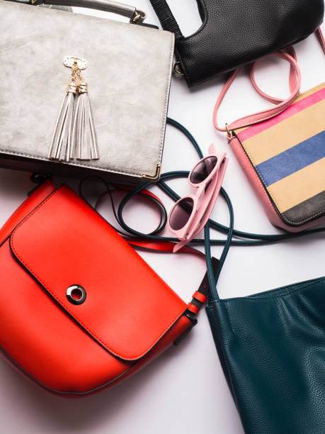 istock Woman's bags purses on white 1012452618