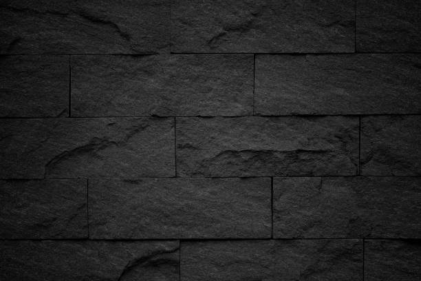 istock Dark grey black slate background or natural stone texture. 1012455958