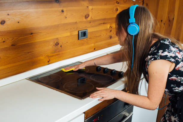 istock Beautiful Housewife Working in the Kitchen 1012459648