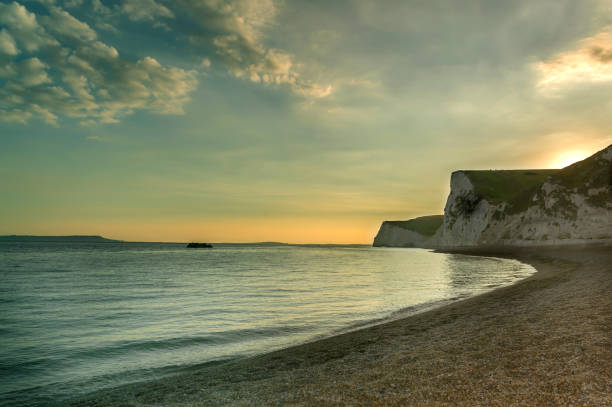 istock Durdle door - sunset - turist place 1012460584