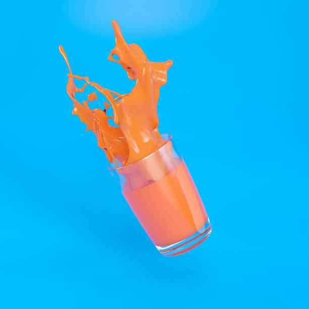 istock Orange Drink with Glass Against Blue Background 1012475714