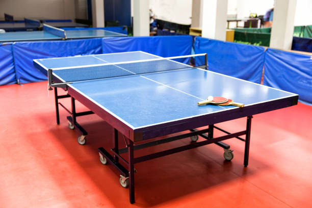 istock Blue ping pong tables in the gym 1012478134