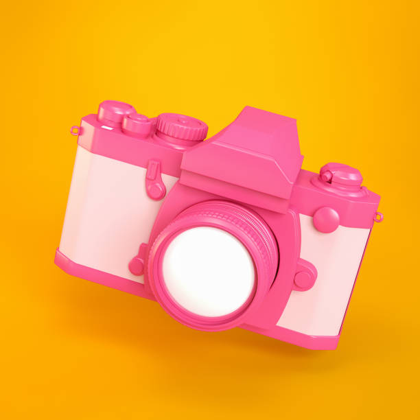 istock Retro SLR Camera on Orange Background 1012478390