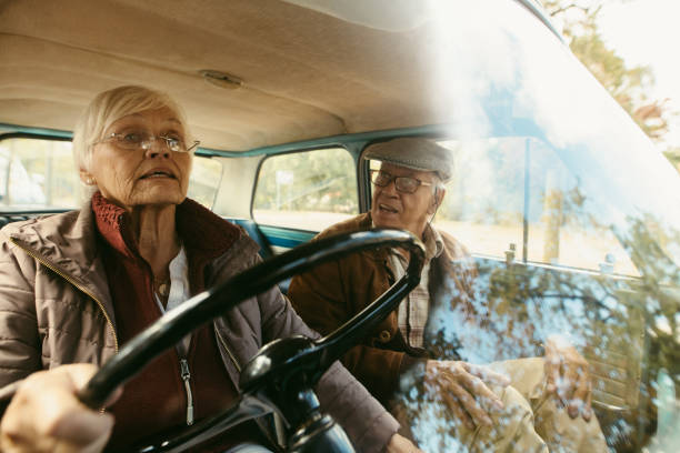 istock Senior couple traveling by car 1012481504