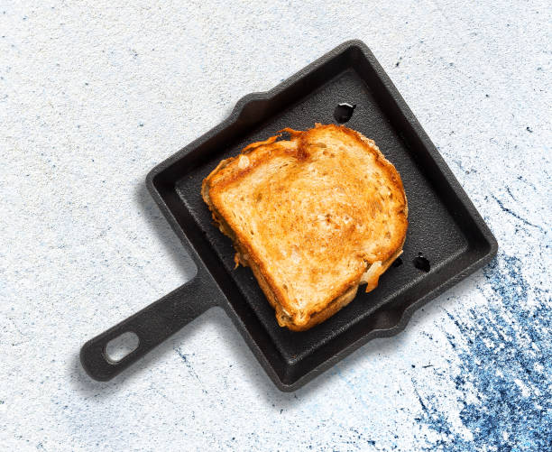 istock Cast Iron Pan & Grilled Cheese Sandwich 1012486682