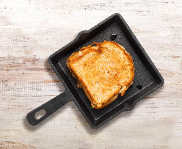 istock Cast Iron Pan & Grilled Cheese Sandwich 1012486690