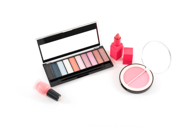 istock Beauty concept : Eye shadow palette , lipstick , compact blush and nail polish isolated on white background , cosmetic products for makeup 1012496800