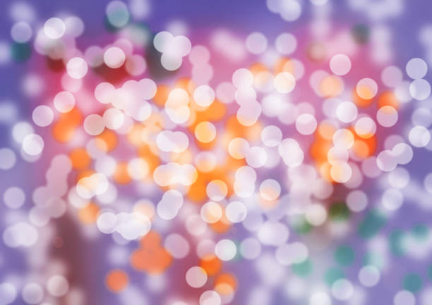 istock mixed color yellow orange purple pink  bokeh abstract background 1012497320
