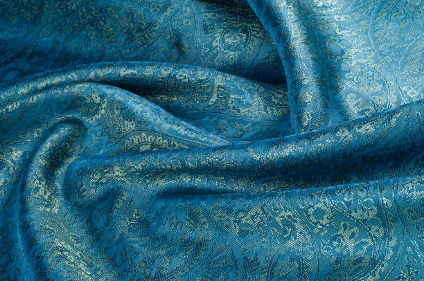 istock Background texture, pattern. Blue paisley silk chiffon mod fabric by the yard. Crinkled, flowy, soft, very light, 1012519476