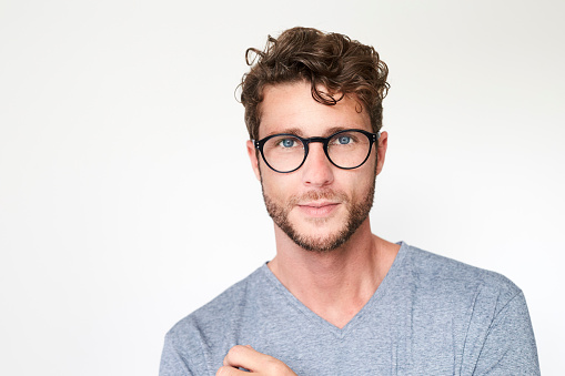 Portrait of handsome guy in glasses