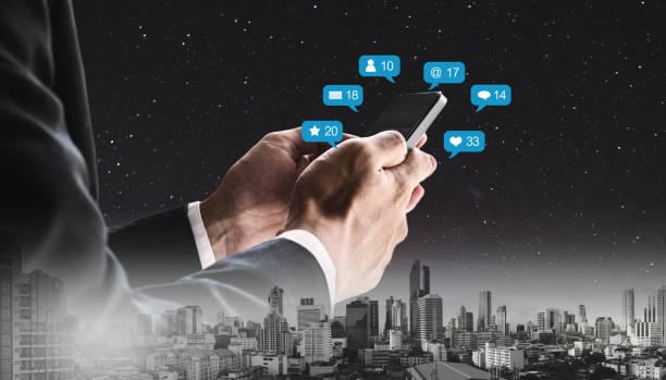 istock Double exposure, Businessman using mobile phone and notification icons 1012530436