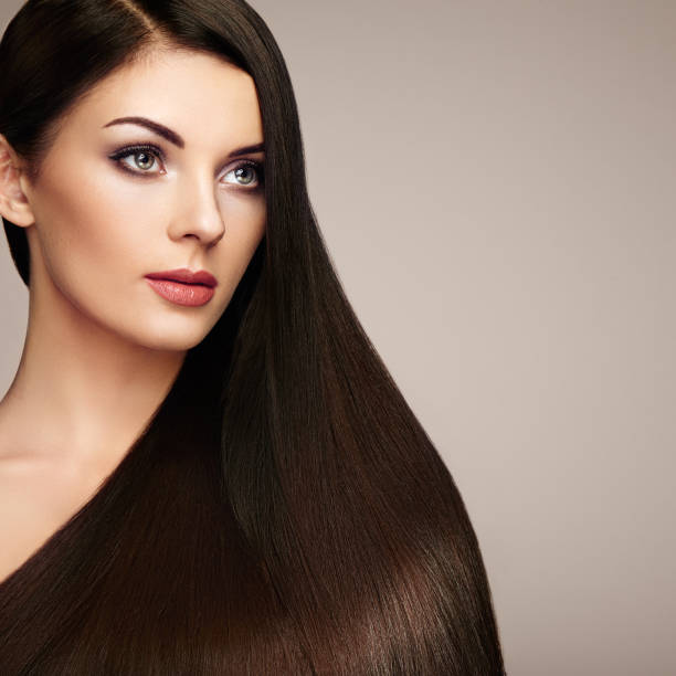 istock Beautiful woman with long smooth hair 1012542630
