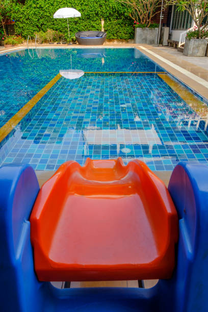 istock Slide to the children's pool. Suitable for young children because it is safe. 1012561412