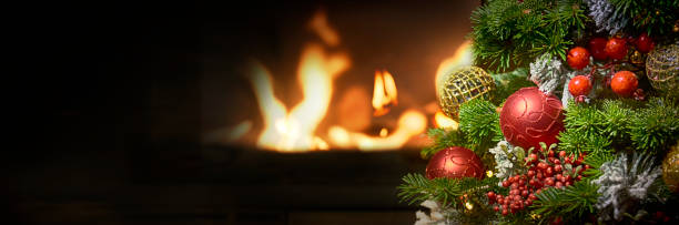 istock Beautiful decorated fireplace and Christmas tree 1012562626