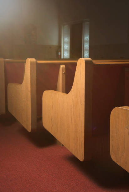 istock Empty Pew on the Inside of a Church Building 1012570824