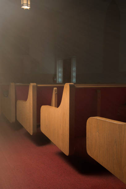 istock Empty Pew on the Inside of a Church Building 1012570896