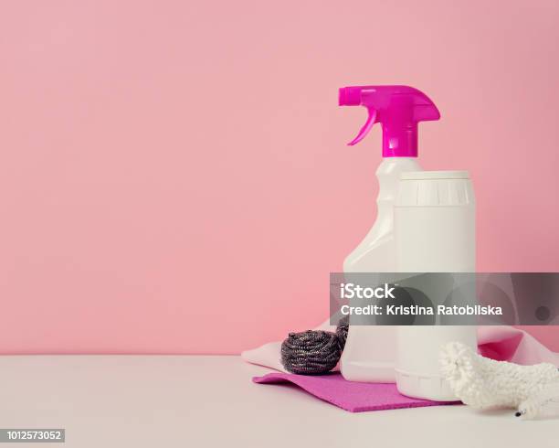 House Cleaning Products On Pink Background Stock Photo - Download Image Now  - Antiseptic, Border - Frame, Bottle - iStock