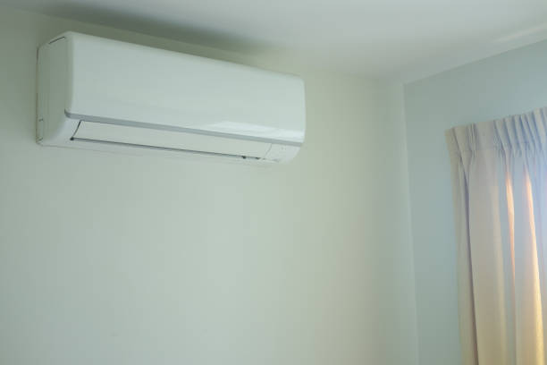 istock Air conditioner wall mounted in the bedroom for air conditioning. 1012577034