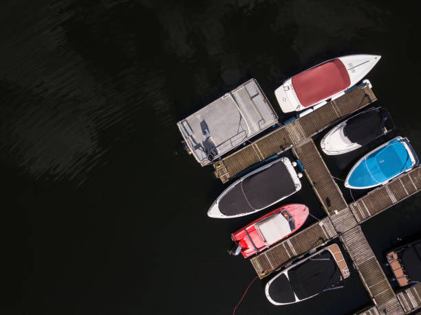istock Boats are anchored to a dock, Thuringia, Germany 1012580504