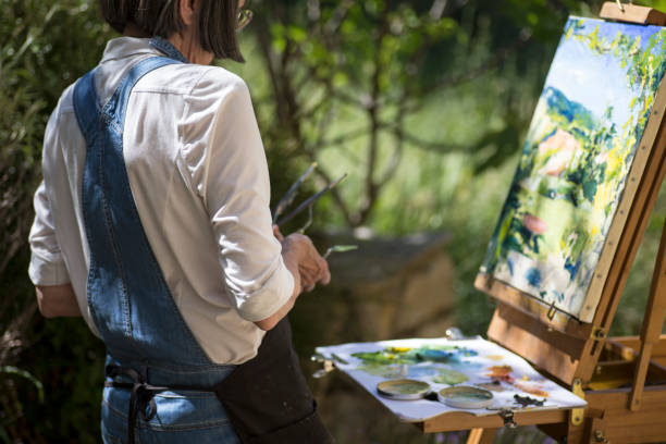 istock Active mature woman, painting in Provence 1012580610