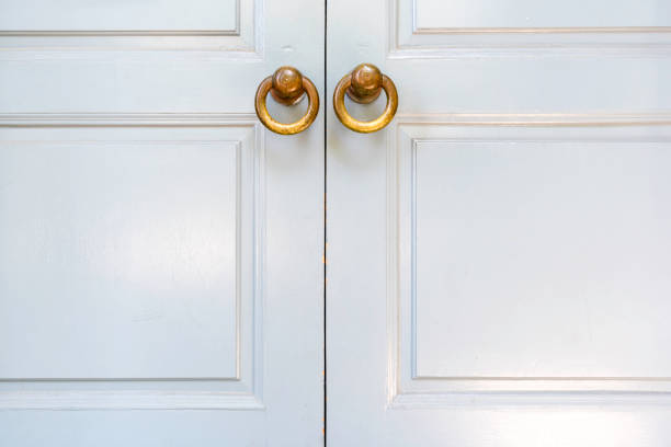 istock Plain white wooden doors 1012581292
