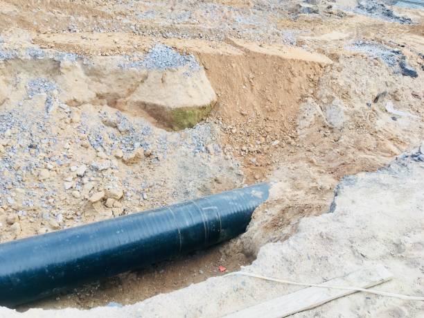 istock Water pipes in sand repair 1012586734