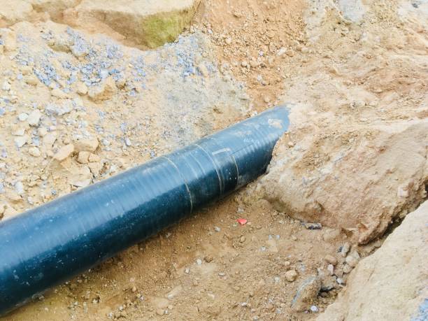 istock Water pipes in sand repair 1012586798