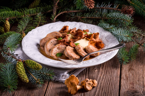 istock Mashed potatoes with pork medallions and chanterelle sauce 1012607296