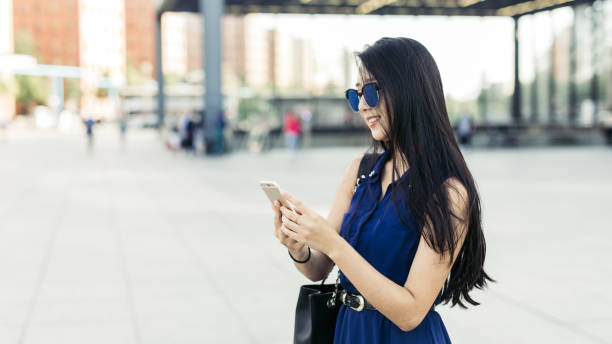 istock Businesswoman checking her phone. 1012632850