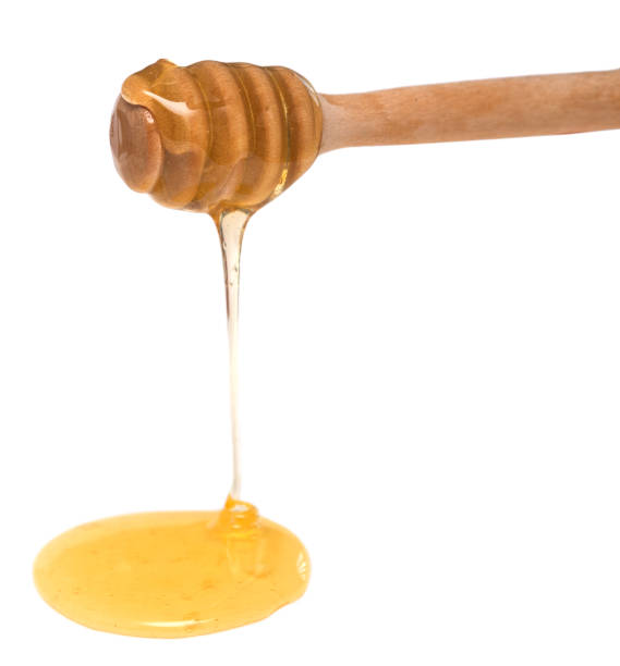 istock Wooden honey dipper 1012634210