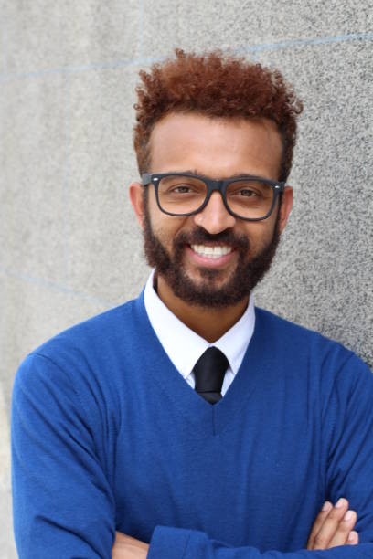 istock Handsome entrepreneur with arms crossed 1012644622