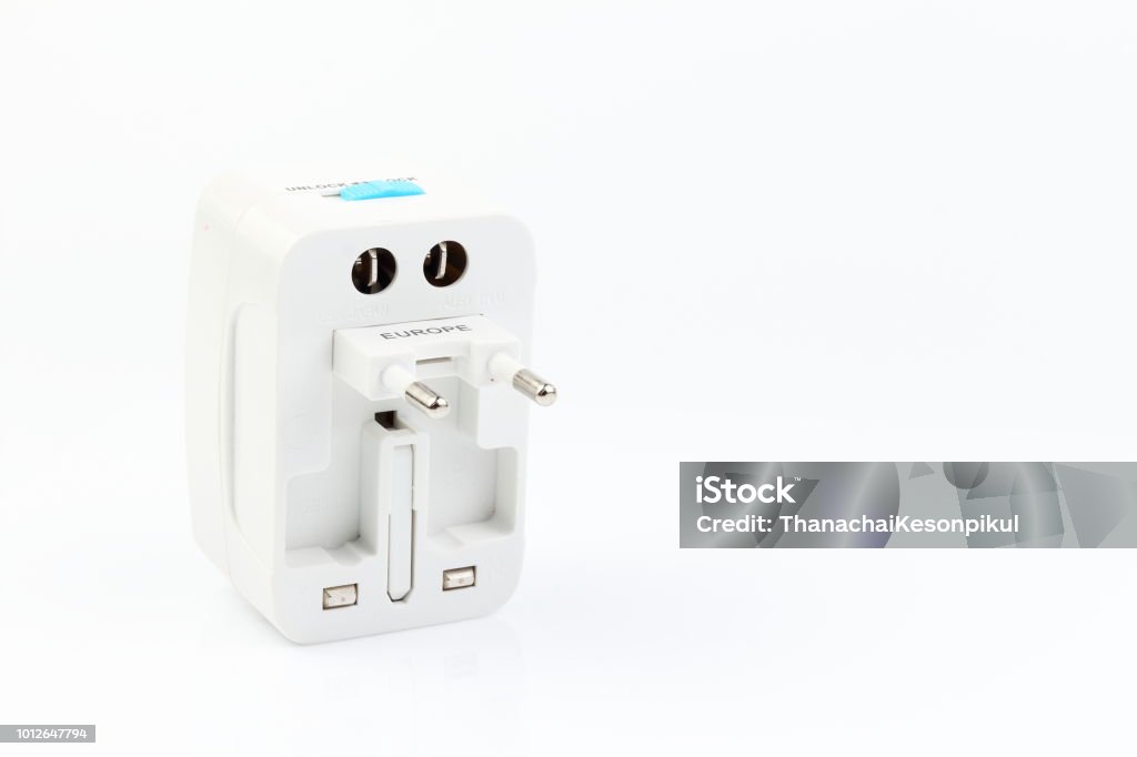 Universal travel adapter plug. isolated on white background. For travelers to many countries. Need a power adapter for electrical appliances. Universal travel adapter plug. isolated on white background. For travelers to many countries. Need a power adapter for electrical appliances.Universal travel adapter plug. isolated on white background. For travelers to many countries. Need a power adapter for electrical appliances. Appliance Stock Photo