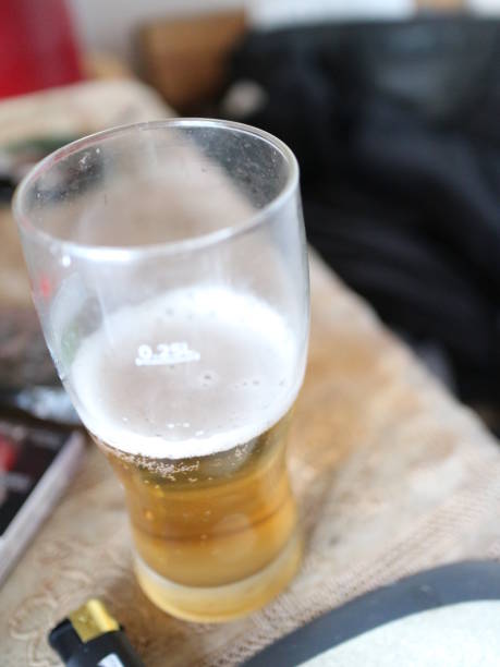 istock a glass of beer on the table 1012648104