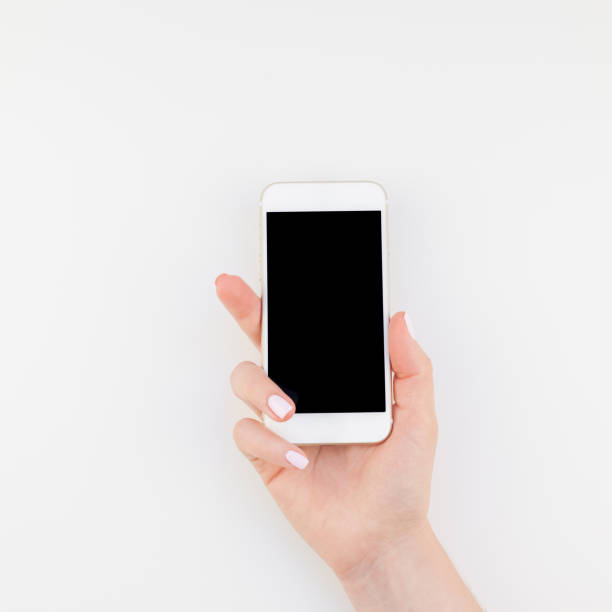 istock Woman hand with smartphone mock up 1012660678