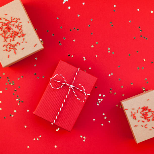 istock New Year or Christmas presents red background 1012666790