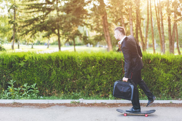 istock Businessman riding skateboard to work 1012669764