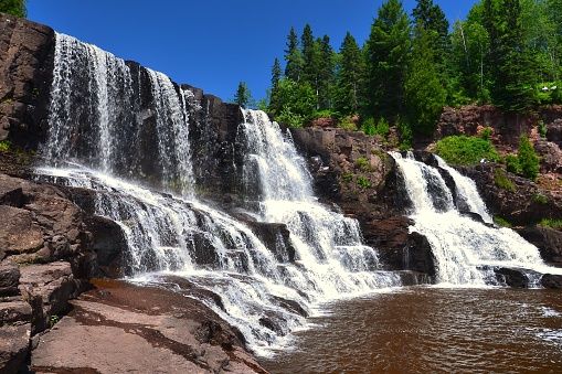 The Gooseberry River tumbles 60 feet over the Middle and Lower Falls creating a pool as it cuts through volcanic bedrock and enters Lake Superior.