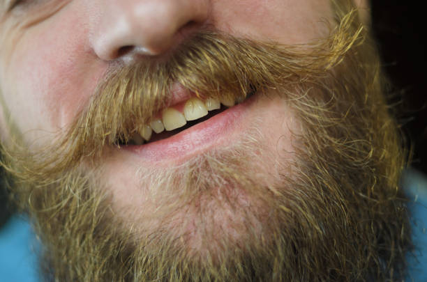 istock Smile with Mustache Close Up 1012679994