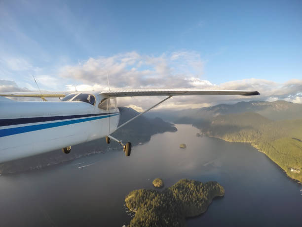 istock Airplane Flying in BC, Canada 1012687674