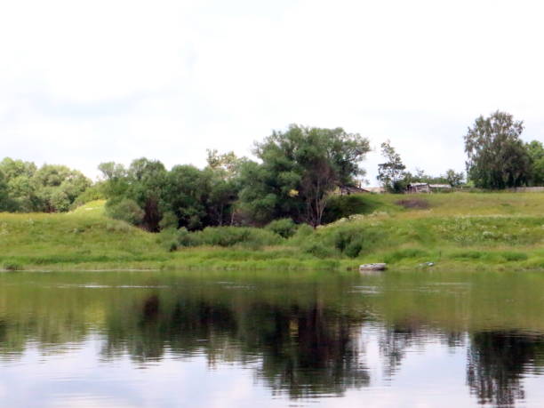 istock fishing in the river on a summer day 1012699004