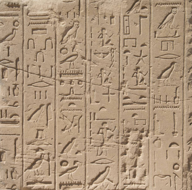 istock old egypt hieroglyphs carved on the stone 1012699172
