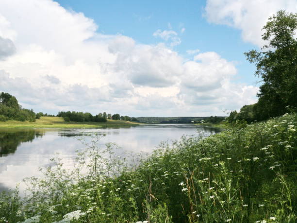 istock summer village landscape with large clouds 1012701326