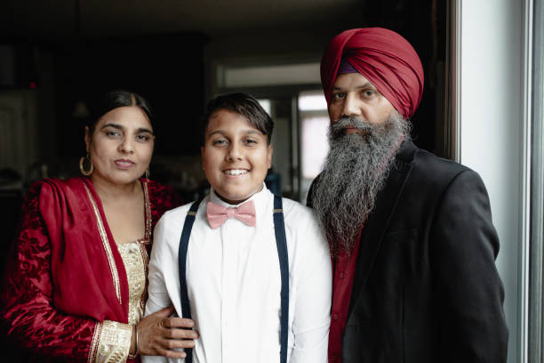 istock Indian parents with their son 1012707018