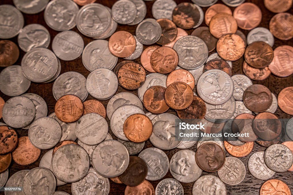 Money on the table This is a shot of loose change on the table Coin Stock Photo