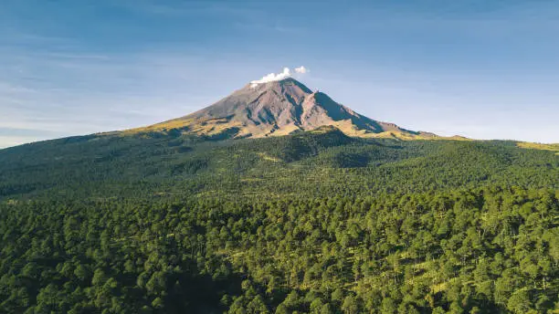 popocatepetl volcano over forest