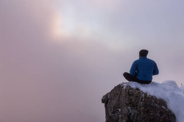 istock Man on top of mountain 1012728122