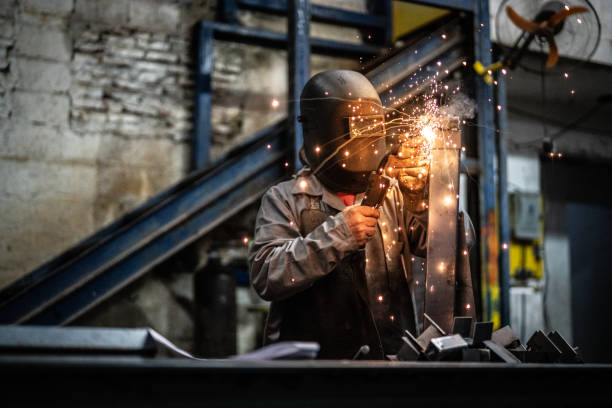 istock Industrial Worker welding steel 1012741176