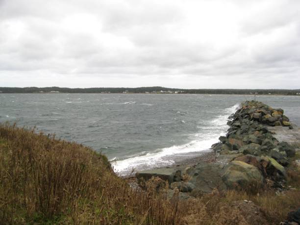 istock Rock point in the ocean 1012754694