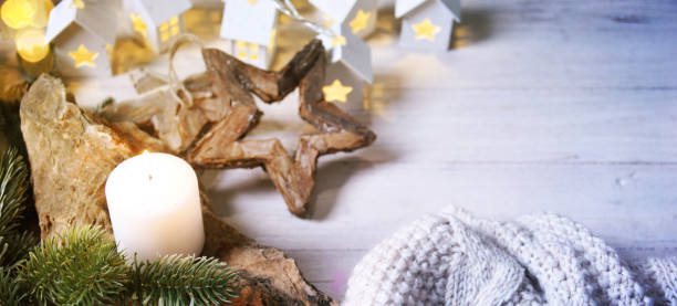 istock Cosy and soft winter background, knitted sweater and lights 1012768292